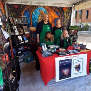 Tucson Book Fair booth for Solitaire Parke and Mira Lucian